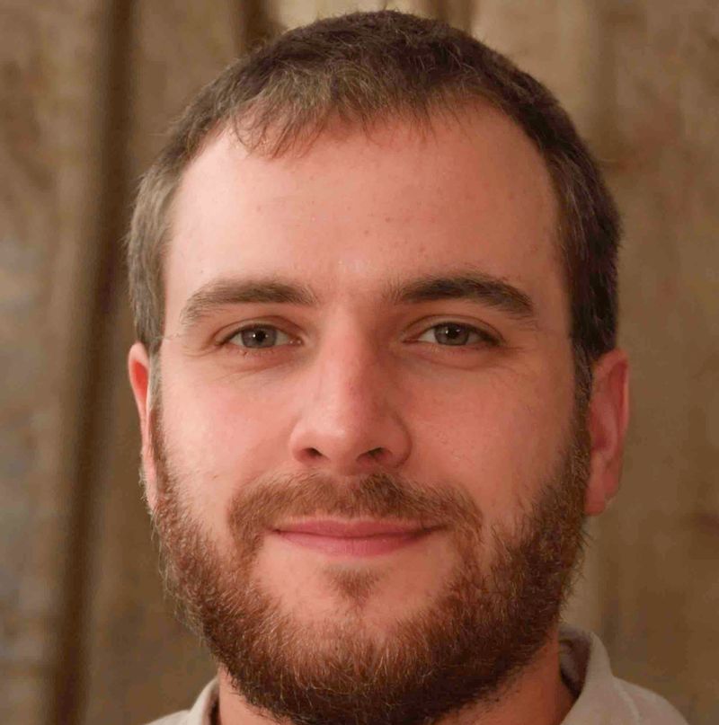 portrait head shot of Will Baker