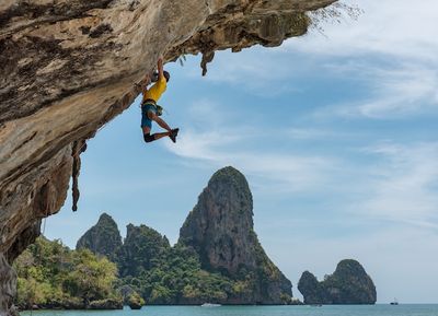 Man rock climbing on a cliff in Oregon